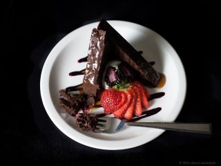 A Piece Of Chocolate Cake On A Plate